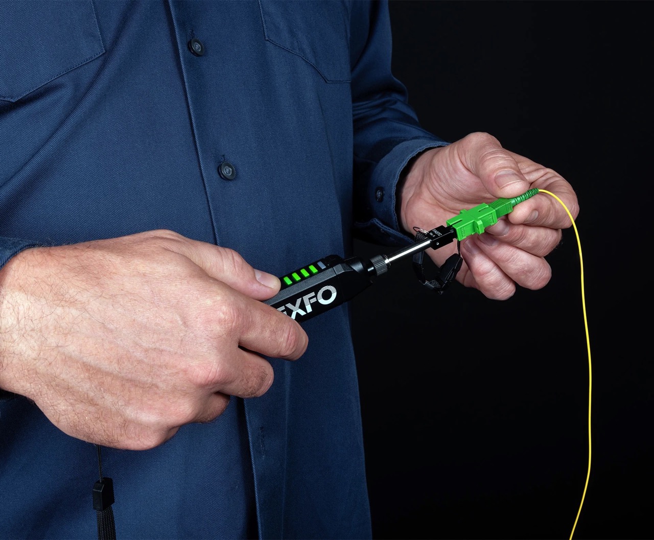 EXFO FIP-200 Connection Checker in hand