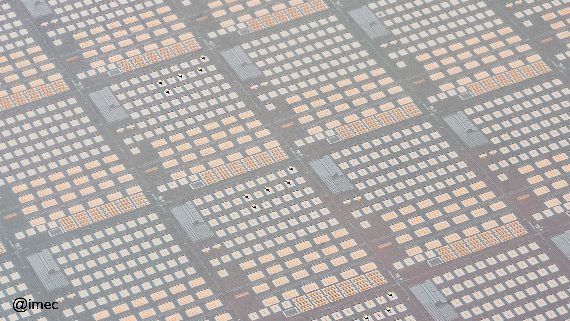DFB laser dies bonded onto a 300mm silicon photonics wafer